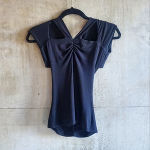 Marciano / Black Top with front and back cutouts and gold detail / Size XS